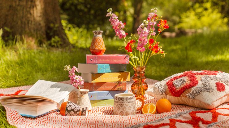 A bundle of Kate Morton books alongside Sass & Belle homeware