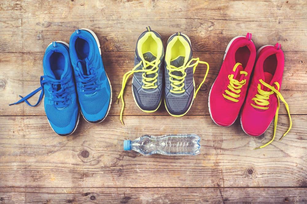 Various pairs of colorful running shoes - Running Gear for Beginners Various pairs of colorful running shoes - Running Gear for Beginners