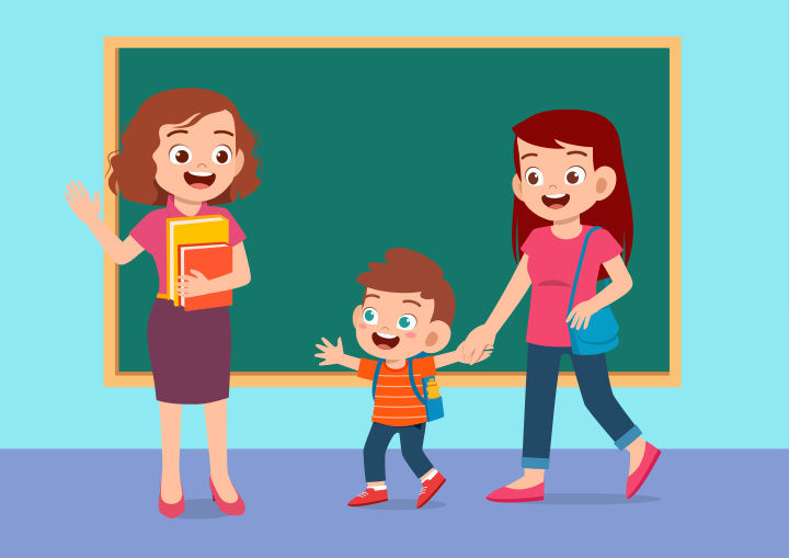 mom and boy greet teacher in the classroom in front of the blackboard