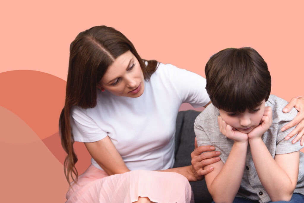 mother comforting sad boy