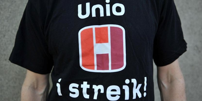 Bilde av t-skjorte på person med tekst Unio i streik.