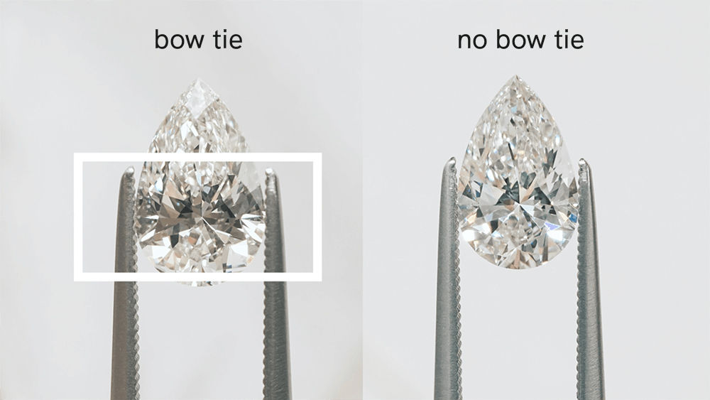 pear shaped diamond ring bow tie effect