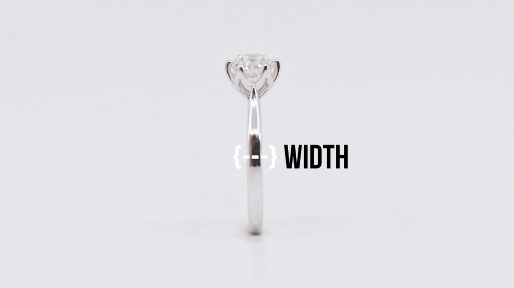 side profile of diamond ring emphasizing the width of ring band