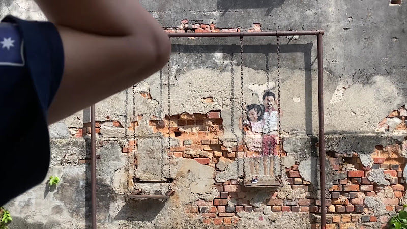 Street Art - Brother & Sister on a Swing