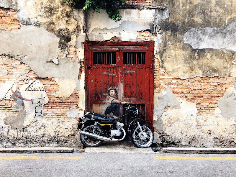 Penang Street Art - Boy on Motorbike by Ernest Zacharevic