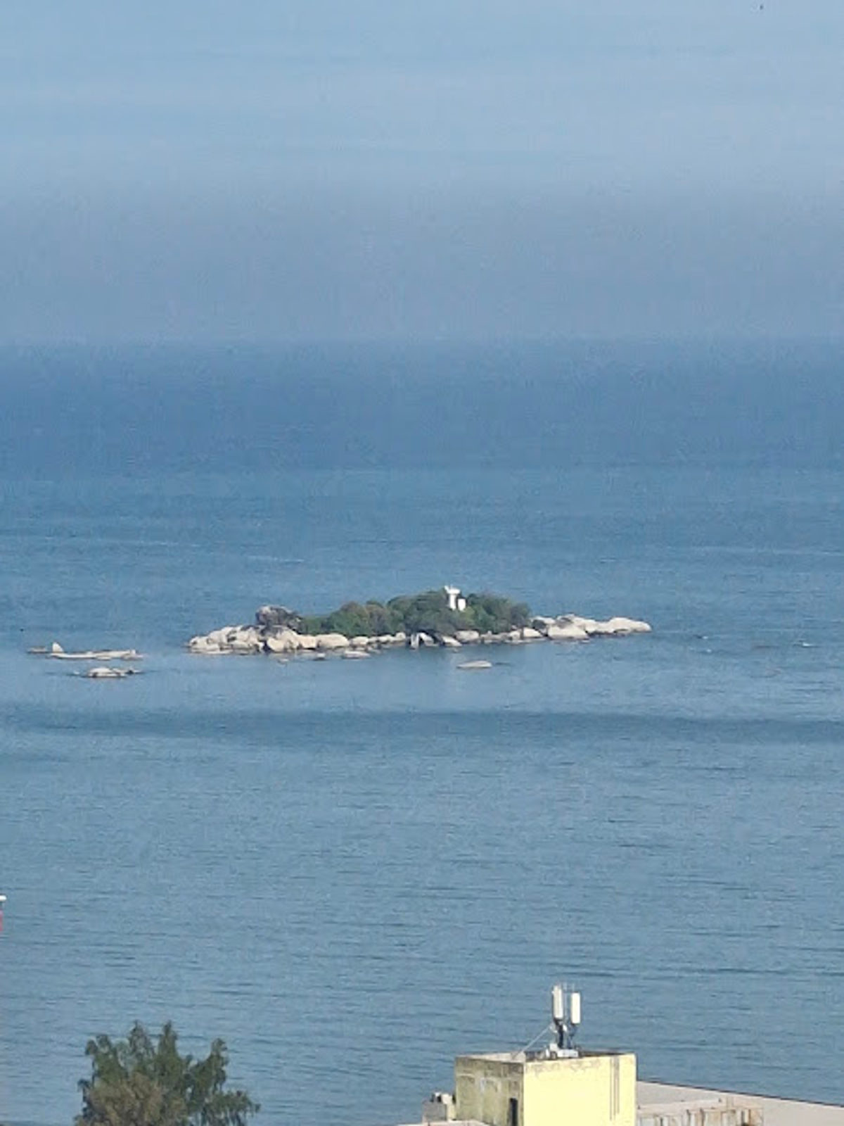 Swing in the Middle of the Sea at Pulau Tikus Island