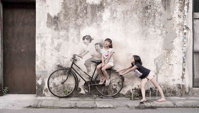 Penang Street Art - Kids on bicycle by Ernest Zacharevic