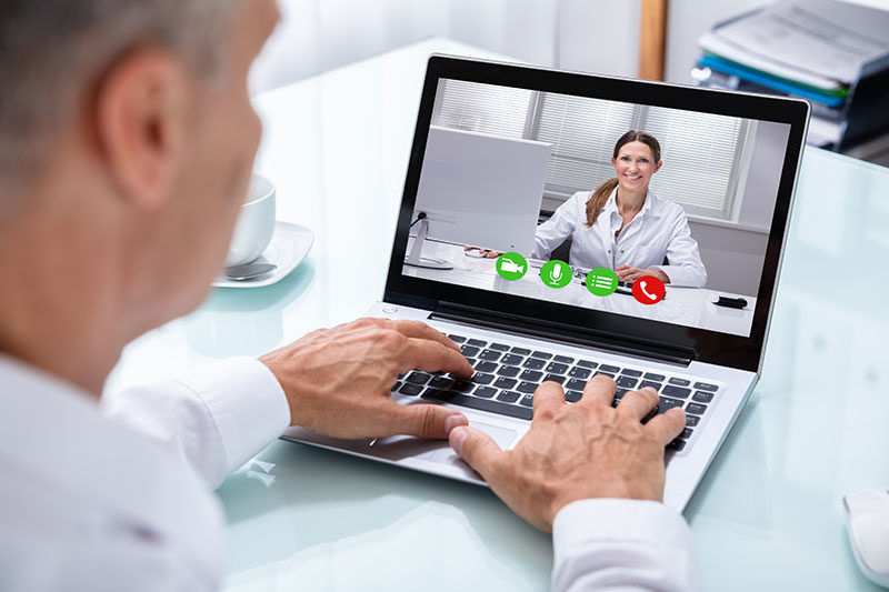 Doctor & Rep Having Facetime Conversation non-personal promotion