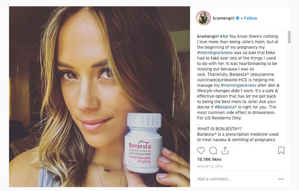 Jana Kramer holding Bonjesta pill bottle to camera post 