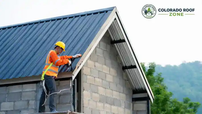 Team of solar technicians installing panels under a clear sky, focusing on renewable energy.