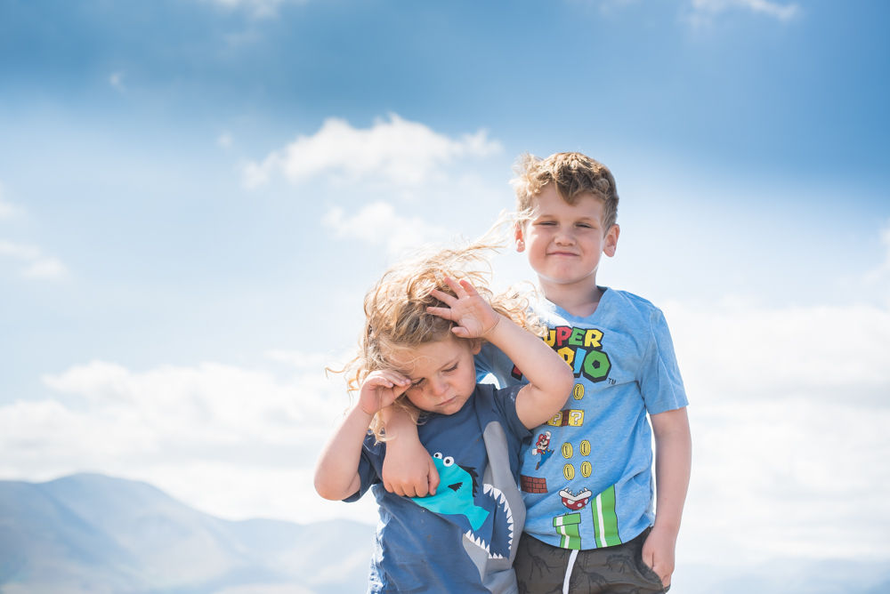 Boys on top of Binsey summitt, Lake District photographers