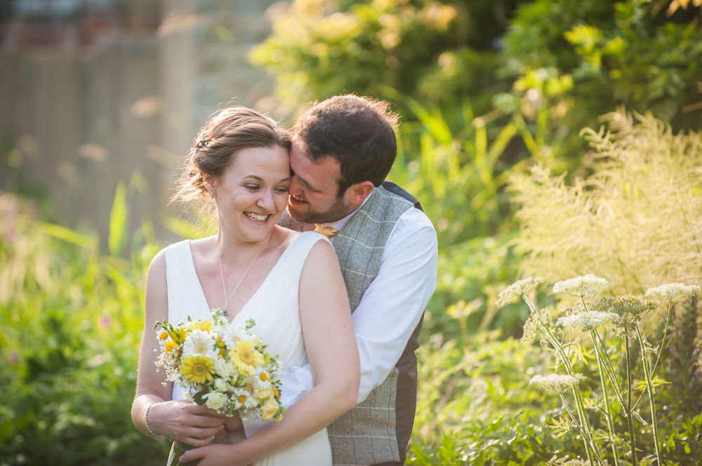 Bride and groom laughing, Sheffield wedding photographers, ringwood hall weddings