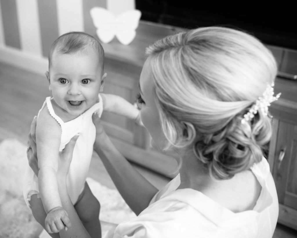 Bride and her daughter cuddles, Wortley Hall, Sheffield wedding photography
