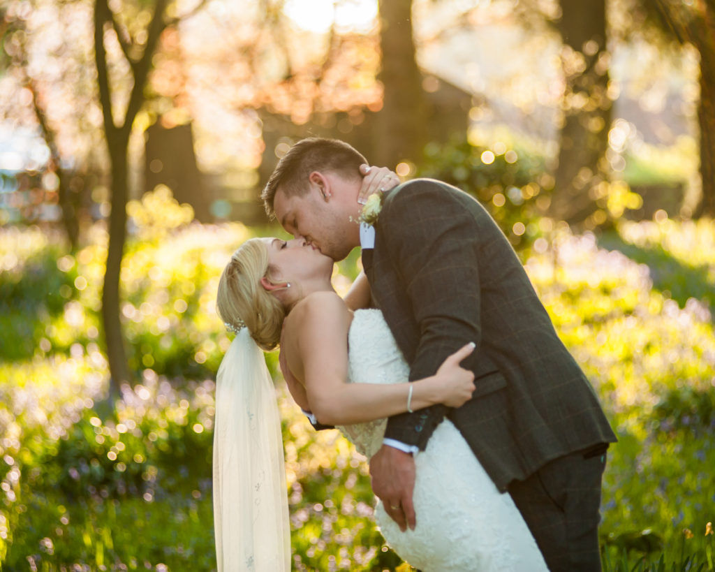 Groom tipping back bride for kiss, Wortley Hall, Sheffield wedding photography