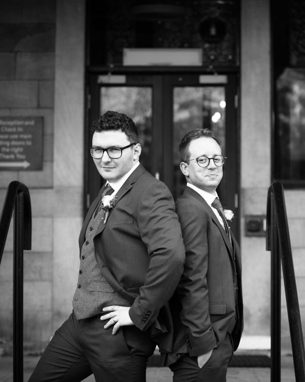 Groomsmen posing at Halifax Hall in Sheffield