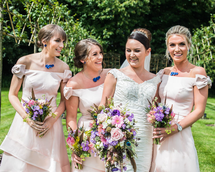 Bridesmaids laughing at Hazel Gap Barn wedding