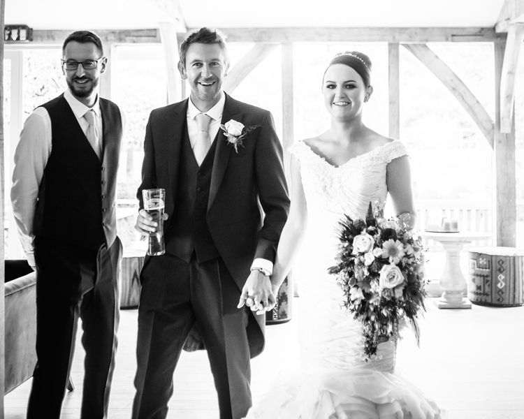 Entering the reception at Hazel Gap Barn at a summer wedding