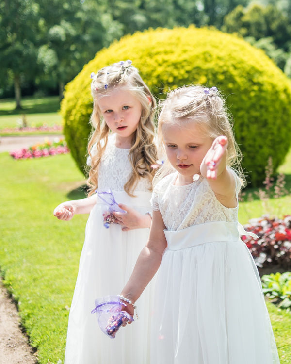 Flower girls scattering confetti at Wortley Hall in Sheffield