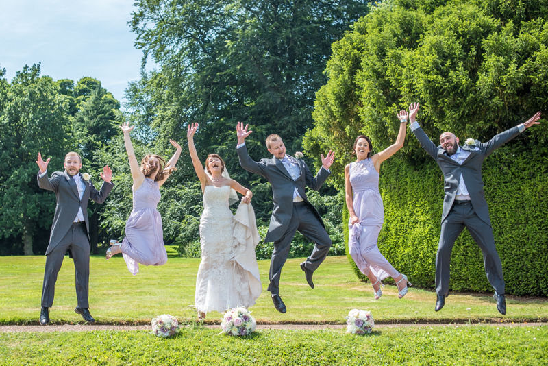 Bridal party jumping at Wortley Hall in Sheffield