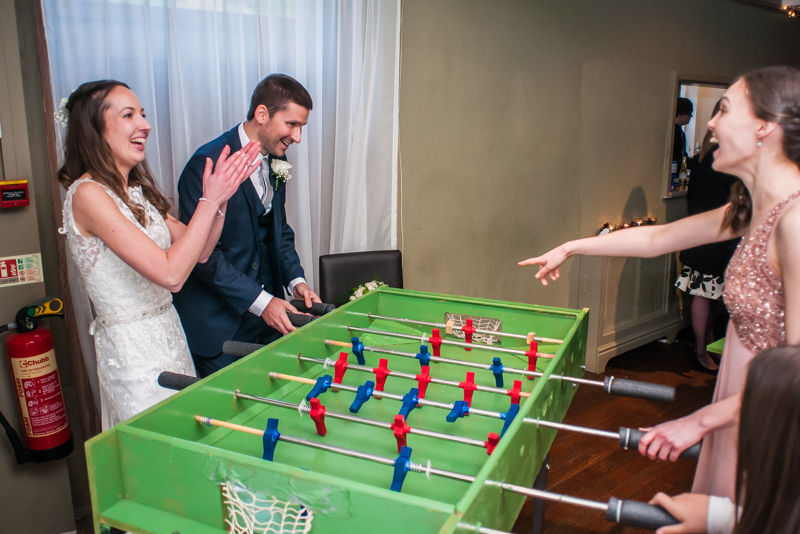 Wedding table football Sheffield wedding photographers Whirlowbrook Hall