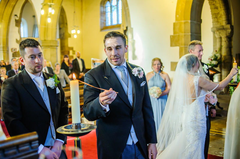 Lighting candles wedding in Whiston