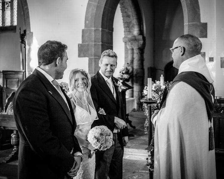 Amanda walking down aisle - Hellaby Hall wedding photographers Rotherham