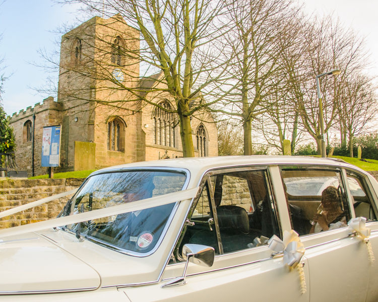 Car leaving Whiston Church in Rotherham