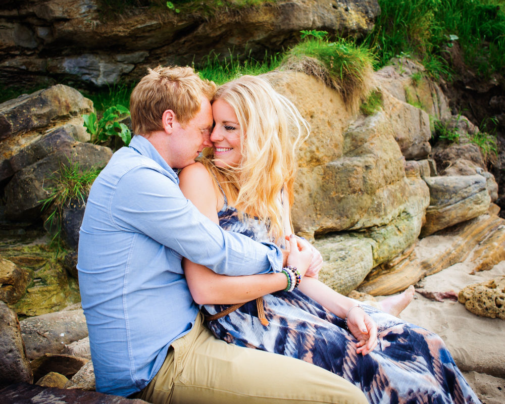 Whispering into ear, wedding photographer Cumbria