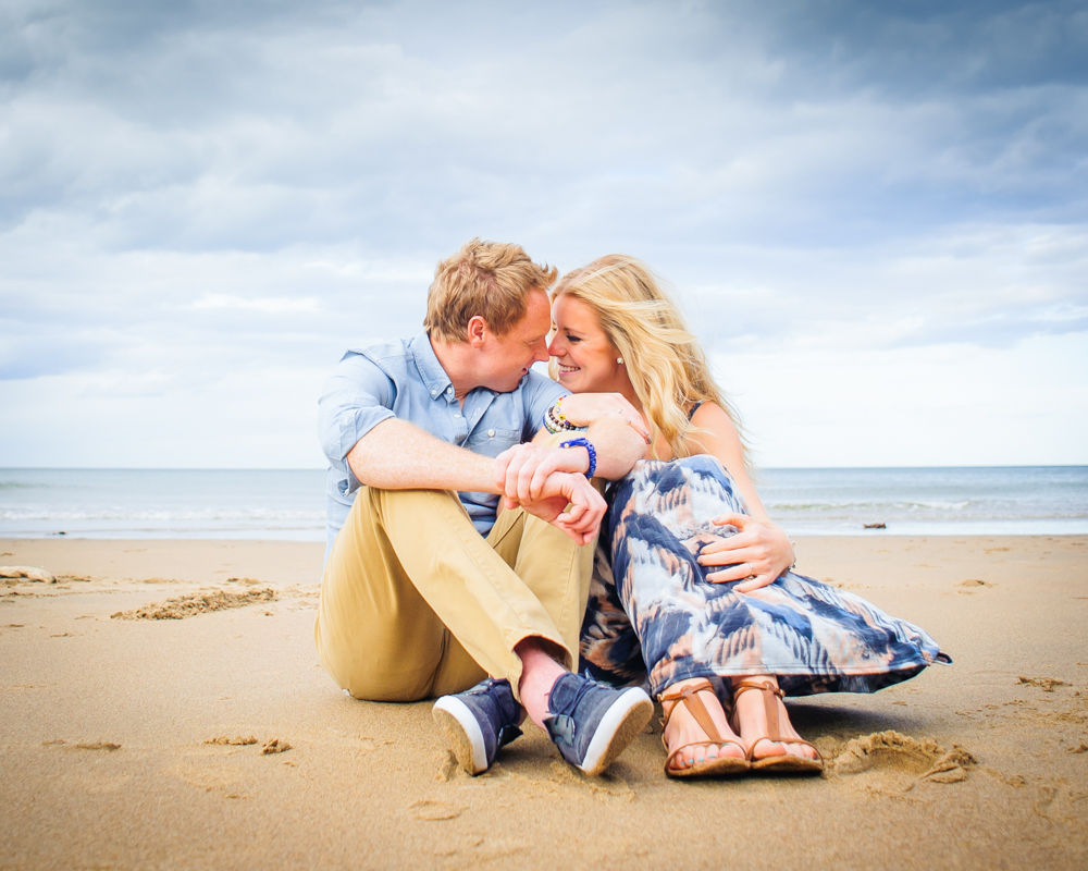 touching noses. engagement portraits Tynemouth
