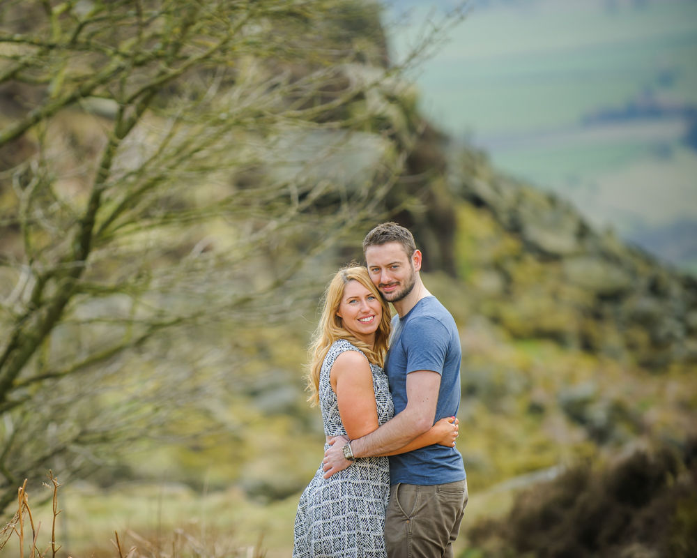 Cuddles on pre-wedding portraits, Curbar Edge