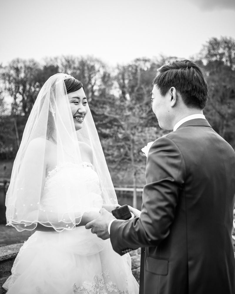 Bride and groom exchanging rings, Sheffield wedding photographer, Chinese wedding