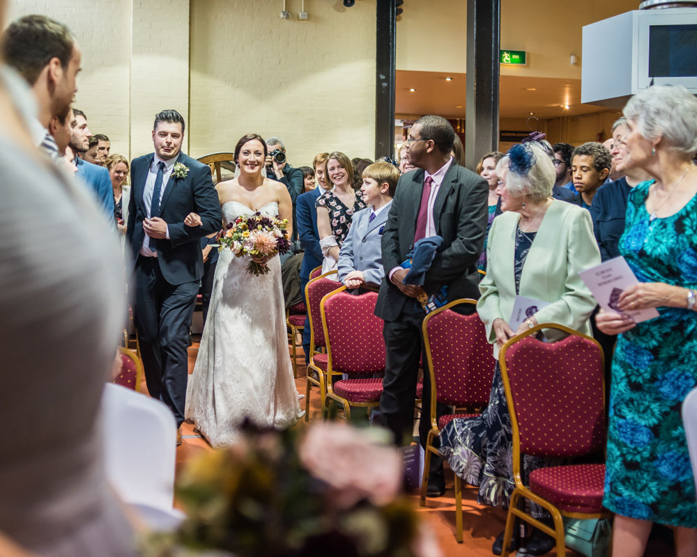 Walking up aisle, Kelham Island wedding, Sheffield photographers
