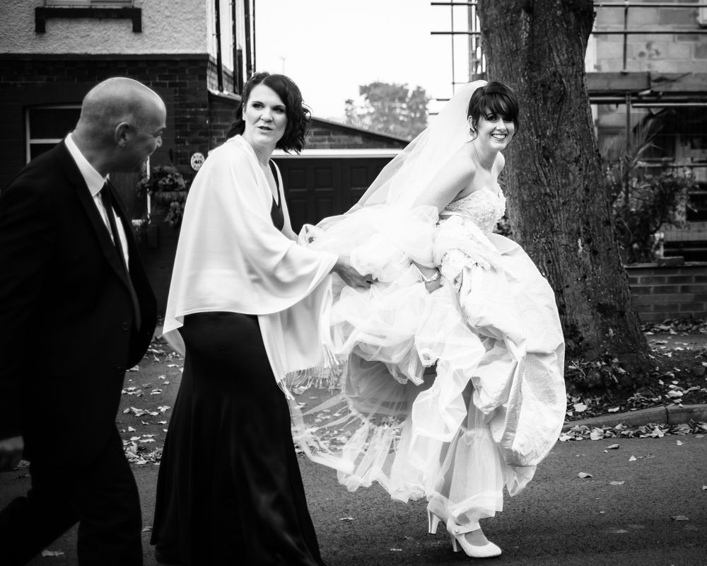 Bride walking to church, Maynard wedding, Sheffield photographers
