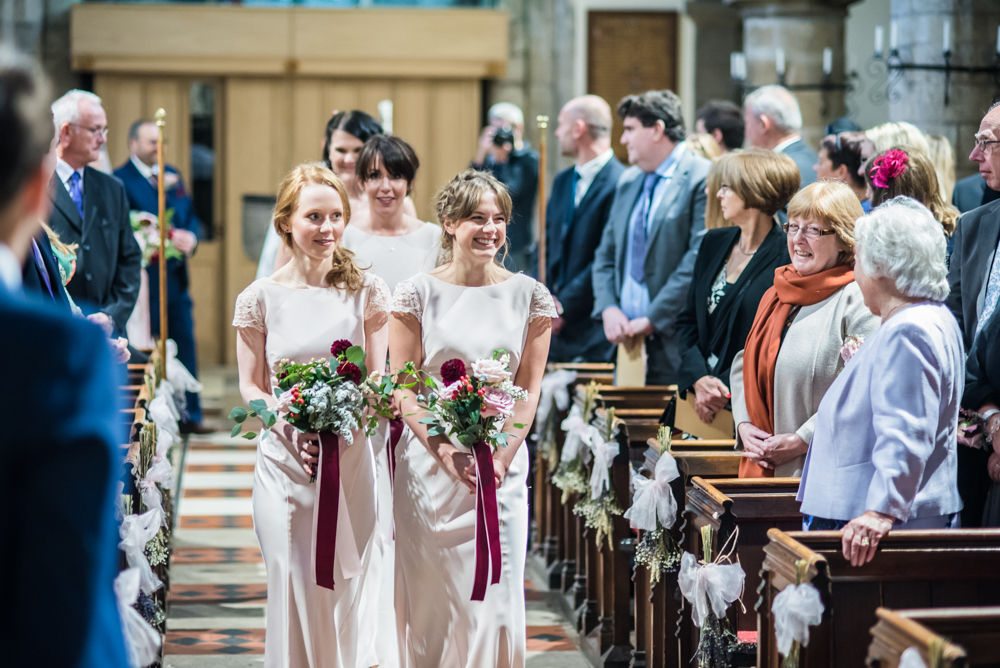 Bridesmaids walking down aisle, St James Church, Sheffield wedding photographers