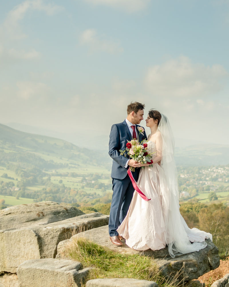 Bride and groom with view of Hathersage, Maynard Arms wedding, Sheffield photographers