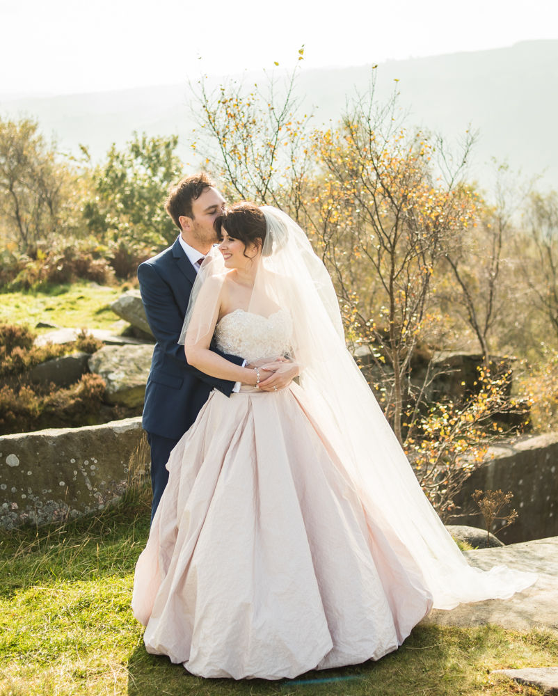 Groom kissing bride, Maynard Arms wedding, Sheffield photographers