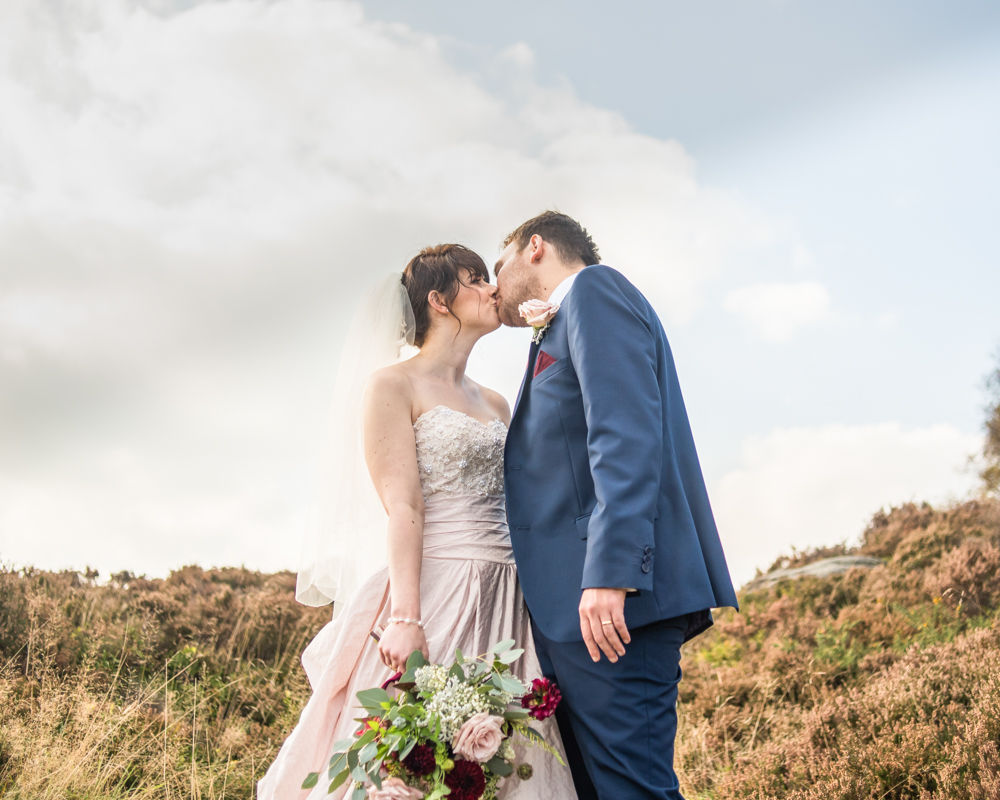 Kissing in the heather, Maynard Arms wedding, Sheffield photographers