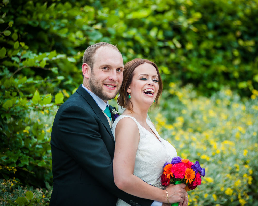 Sheffield wedding photographers, Tankersley Manor , laughing bride and groom