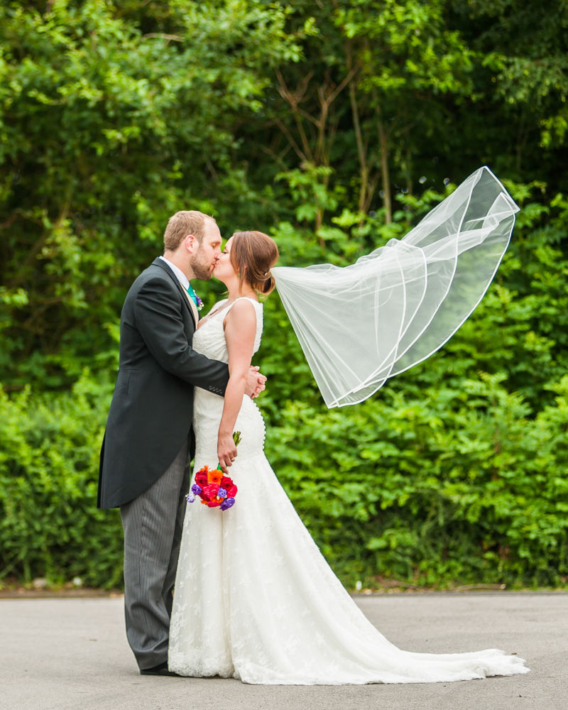 Sheffield wedding photographers, Tankersley Manor , bride veil blowing
