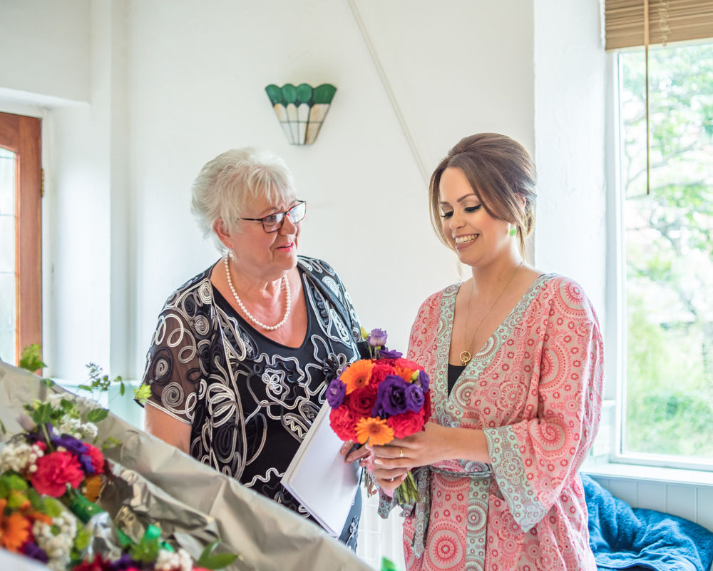 Sheffield wedding photographers, Bride receiving bouquet