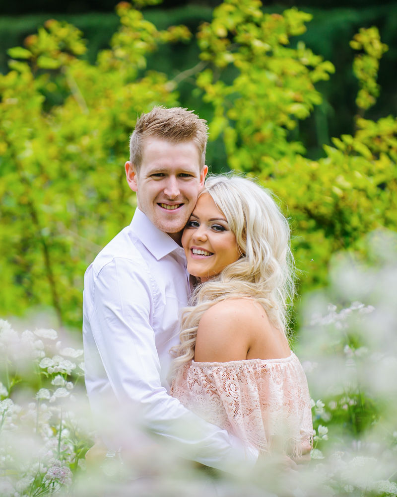 Smiling for camera, pre-wedding photos, Sheffield Botanical Gardens