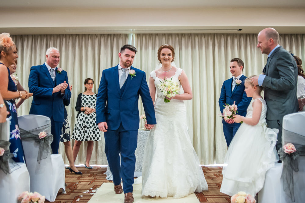 Walking down aisle, Chesterfield wedding photographer, Casa Hotel