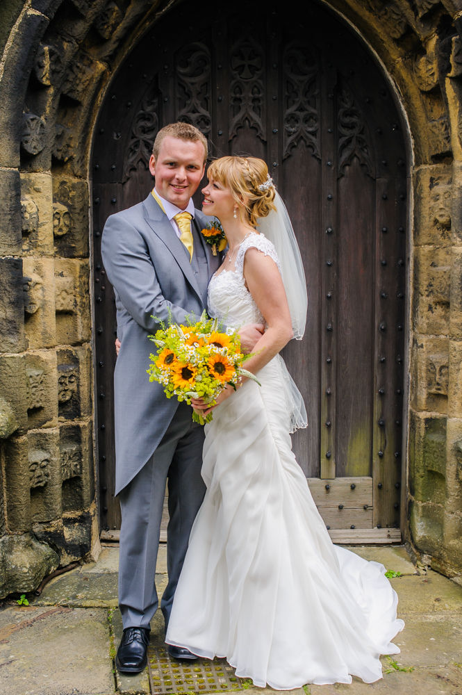 Bride and groom outside church, Sheffield wedding photographers, Smallshaw Farm Cottages