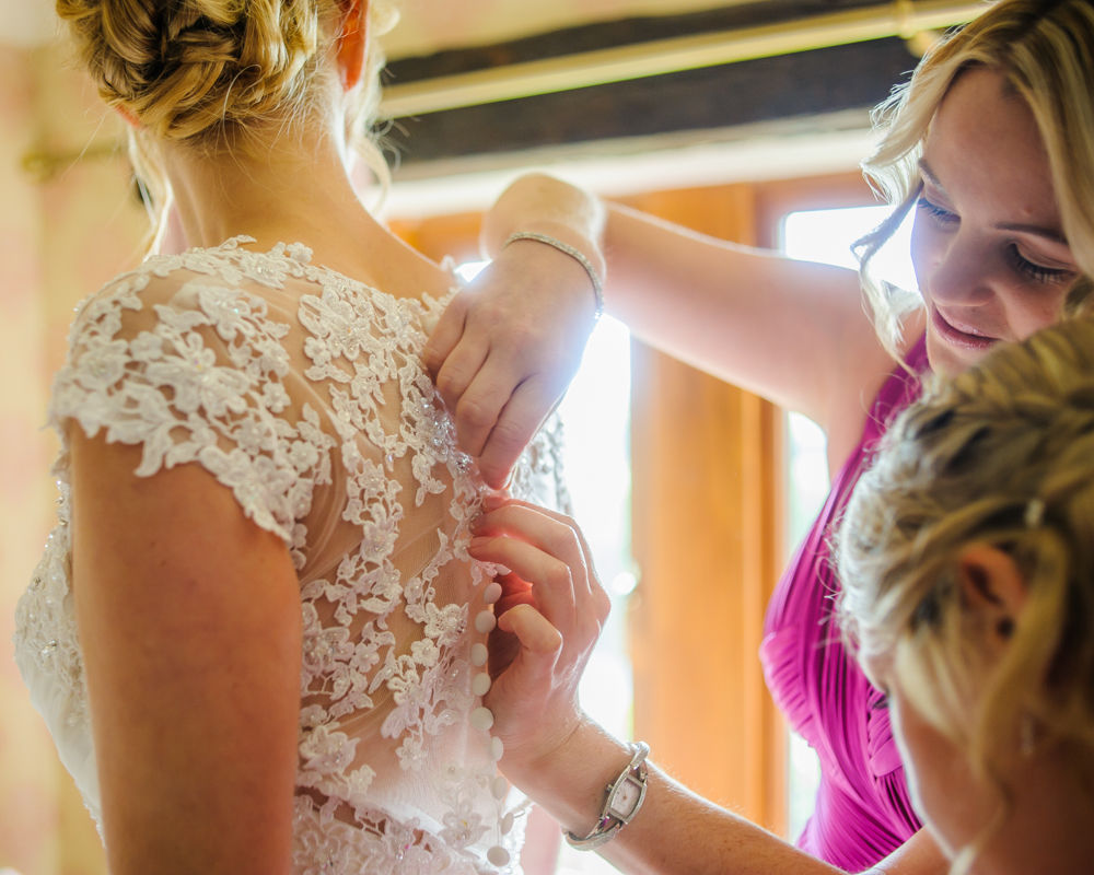 Brides dress details, Sheffield wedding photographers, Smallshaw Farm Cottages