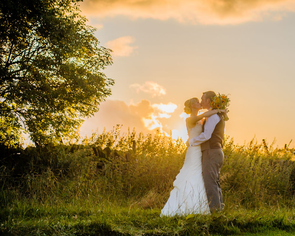 Bride and groom sunset kisses, Sheffield wedding photographers, Smallshaw Farm Cottages