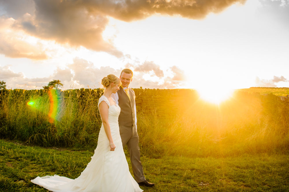 Walking as sun goes down, Sheffield wedding photographers, Smallshaw Farm Cottages