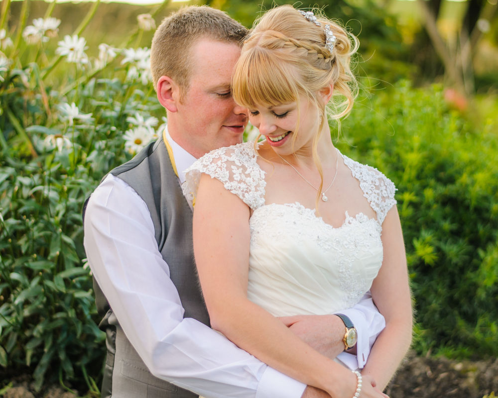 Bride and groom cuddles, Sheffield wedding photographers, Smallshaw Farm Cottages