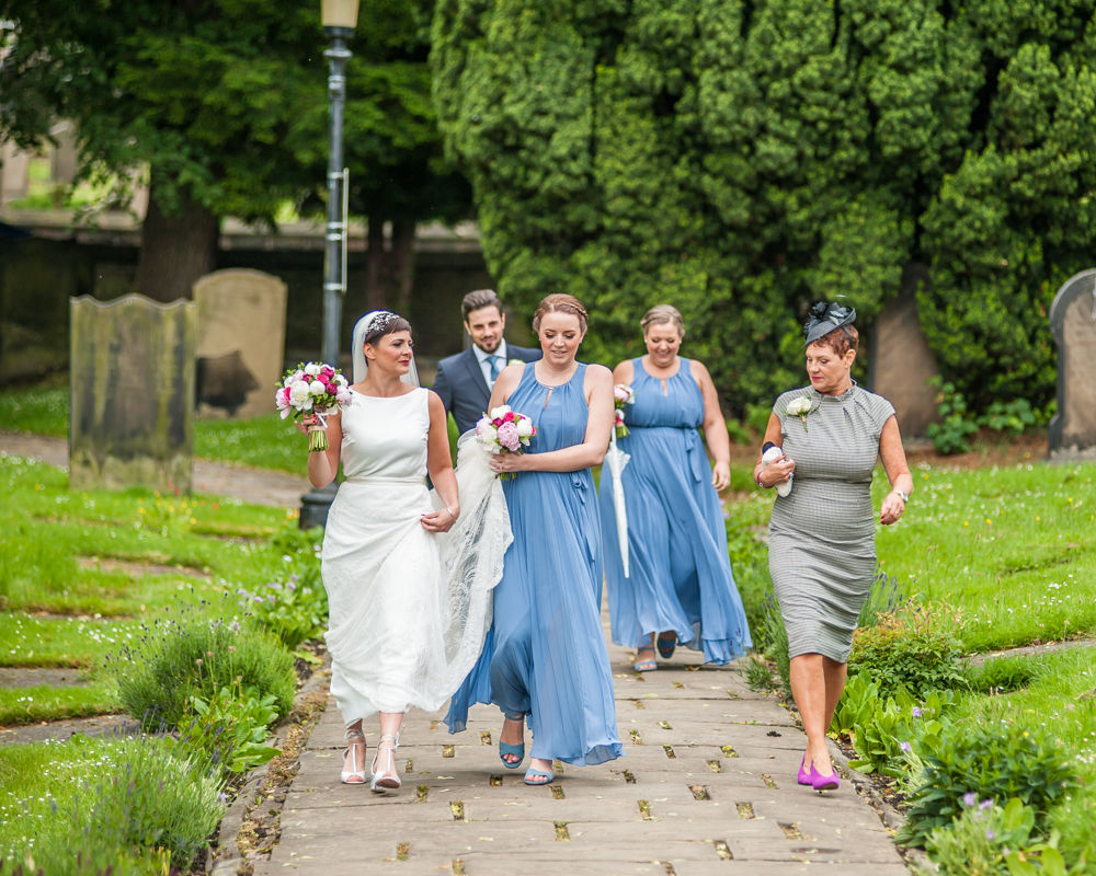 Bride and her squad walking to church, Sheffield wedding photographers