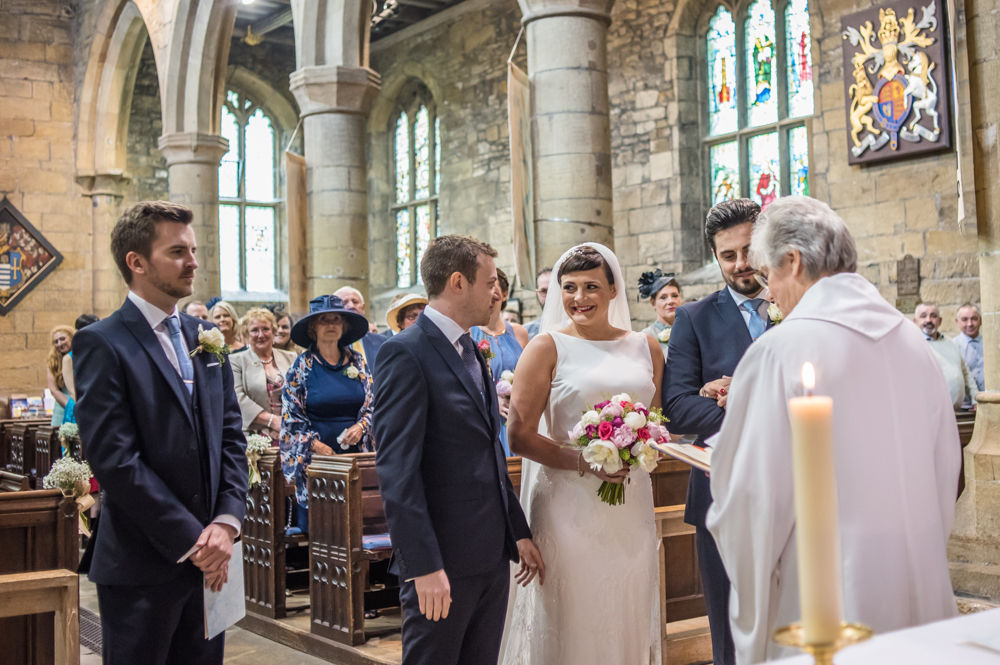 Bride meeting groom at top of aisle, Sheffield wedding photographers