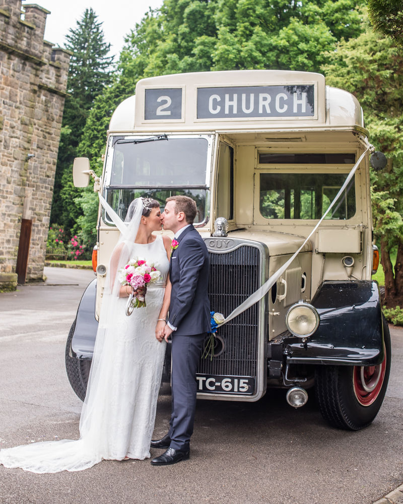 Bride and Groom outside vintage bus, Sheffield wedding photographers, Whirlowbrook Hall
